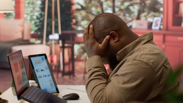 Business owner frustrated by Google Business Profile setup mistakes and verification issues while managing an online business listing.