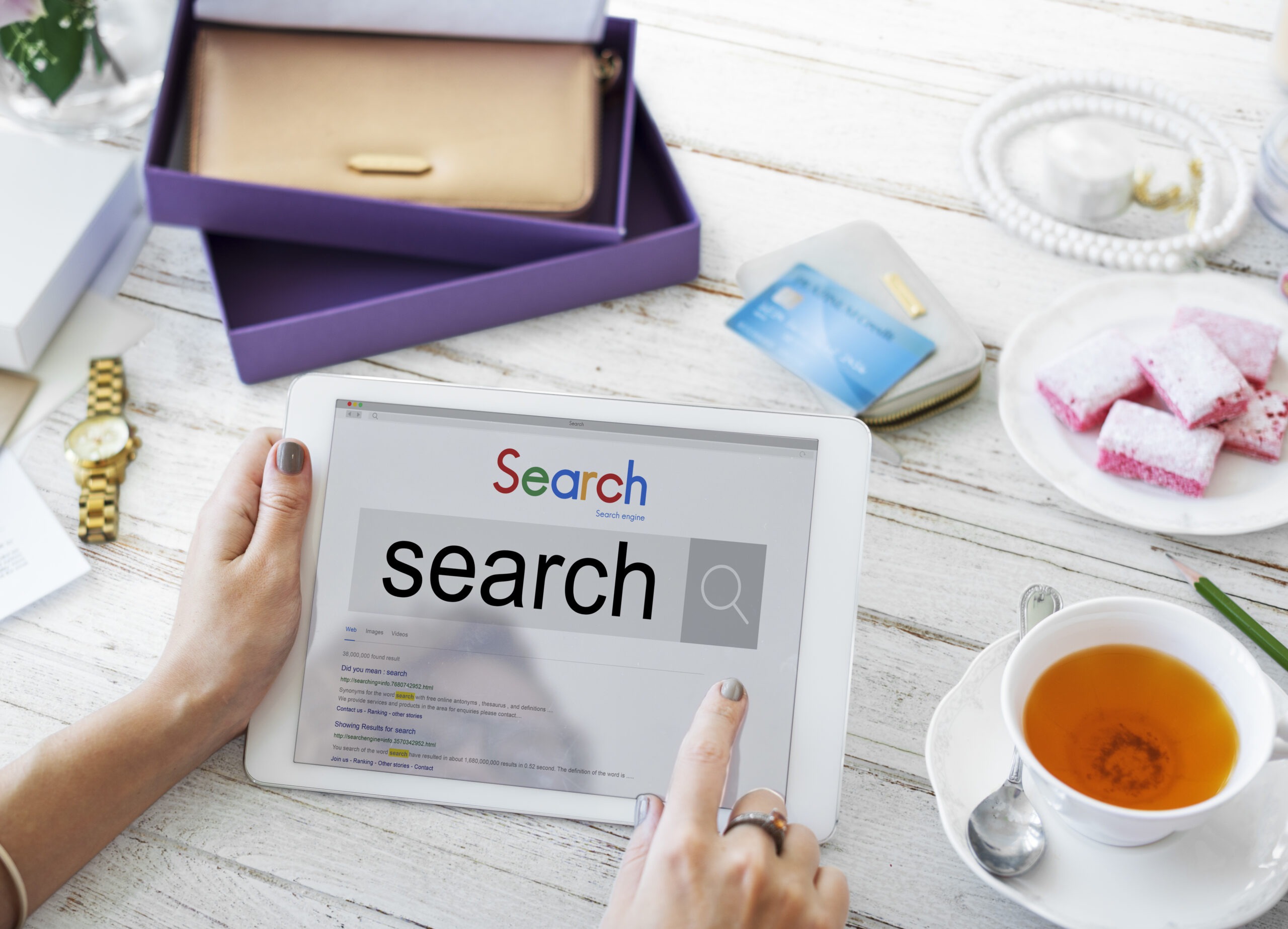 Business owner researching ways to improve Google Business Profile rankings and local search visibility online.