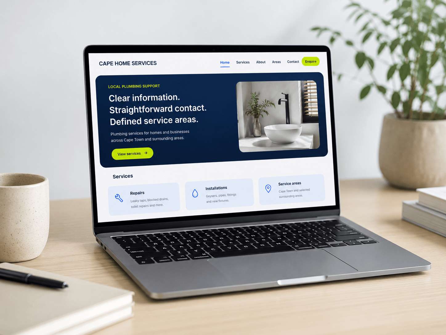A service business website displayed on a laptop